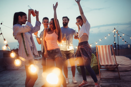 Travelers enjoying a tasteful rooftop gathering in Morocco